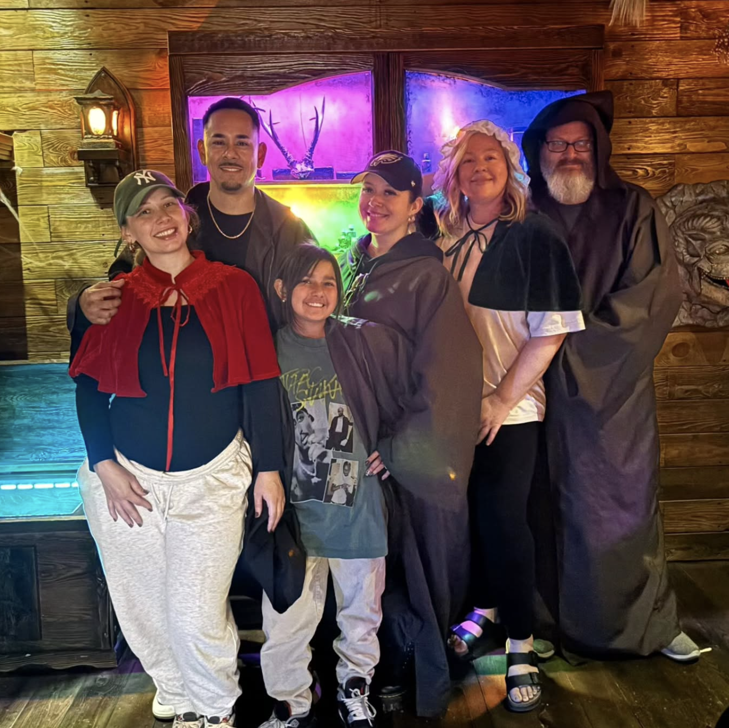 team solving a witch’s curse in spooky escape game