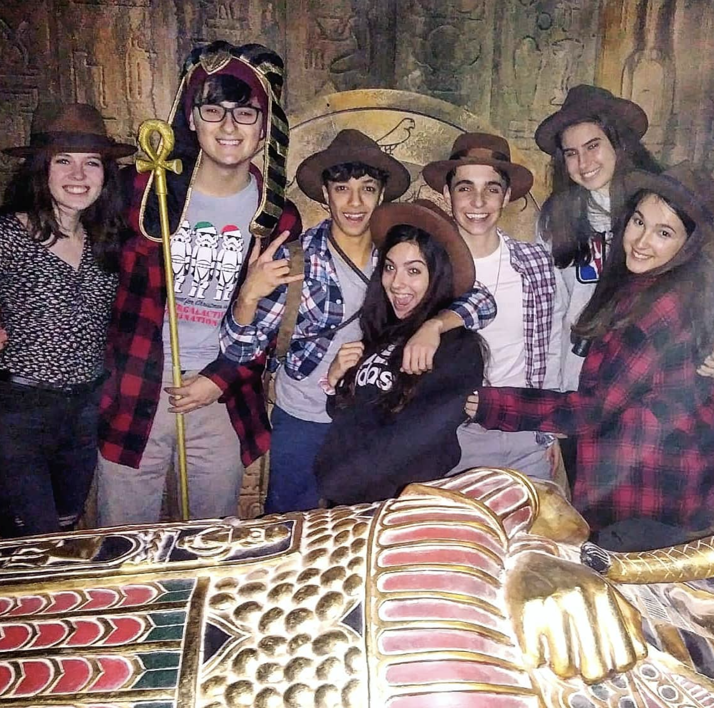 Players solving ancient Egyptian escape room puzzles